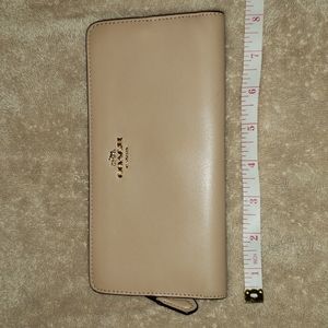 Coach leather zipper wallet.